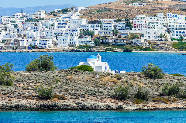 istock Greek Islands - Deep blue water and tiny Orthodox churches 590300286