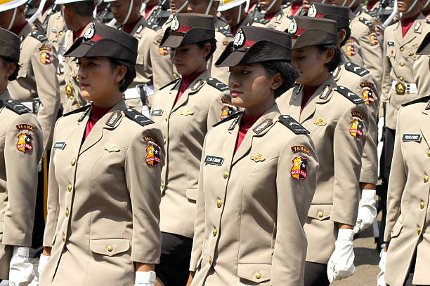 Pyongyang, 12th April 2018. A policewoman controlling traffic in a street of the Capital city of North Korea