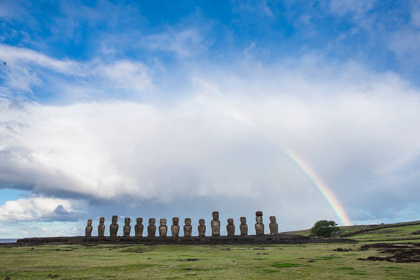 istock Moais of Easter Island with a beautiful rainbow 590301544
