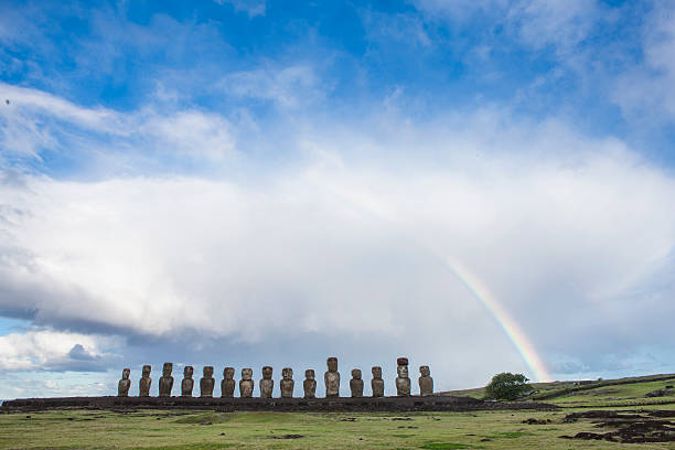 istock Moais of Easter Island with a beautiful rainbow 590301630