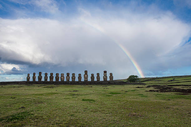 istock Moais of Easter Island with a beautiful rainbow 590301816