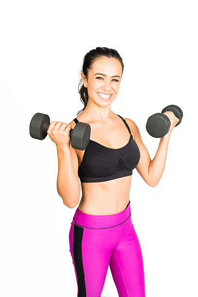 istock Hispanic Women Lifting Dumbells On A White Background 590579382