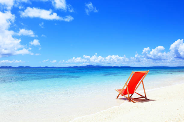 chairs on the beach near the sea. enjoying looking view of sea with blue sky on summer vacation and travel holiday concept.