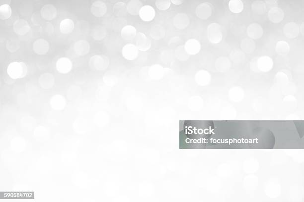 Abstract White Glitter Background Stock Photo - Download Image Now - Defocused, White Color, Lighting Equipment