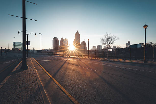 istock Modern city street at sunny morning 590585796