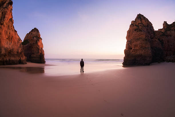 istock Sunset at rocky coastline of Atlantic ocean 590586050