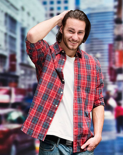 istock Smiling man standing outdoors 590586742