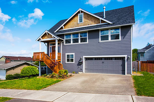 istock Luxurious gray house with front stairway and porch 590587420