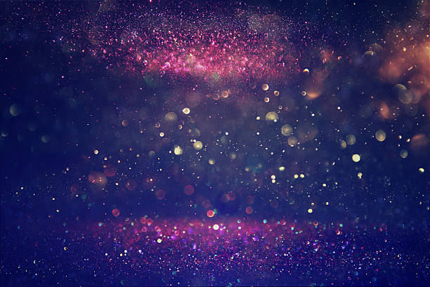 istock glitter vintage lights background. de-focused 590587474
