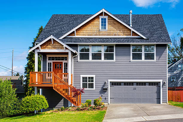 istock Luxurious gray house with front stairway and porch 590587486