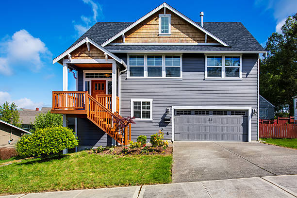 istock Luxurious gray house with front stairway and porch 590587832