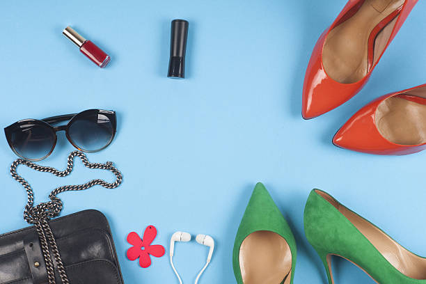 istock Women accessories and shoes on light background. Top view. 590588614