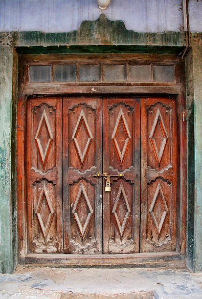 istock Old wooden door at Stone Town 590590310