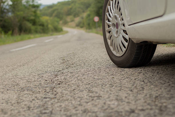 istock Car on a country road 590591122