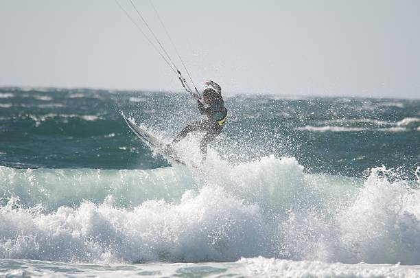 istock Kite surfer riding a wave San Francicso 590591494