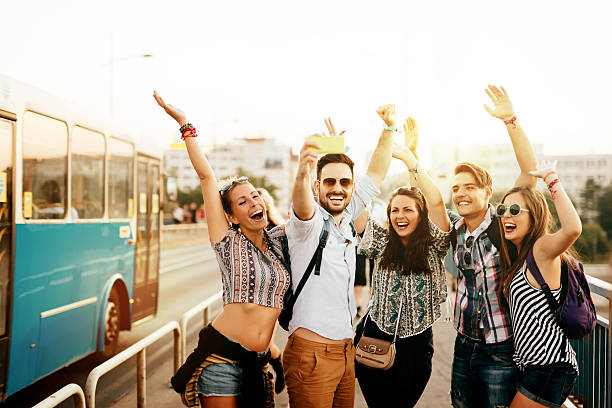 istock Friends travelling, taking selfies and smiling 590591544