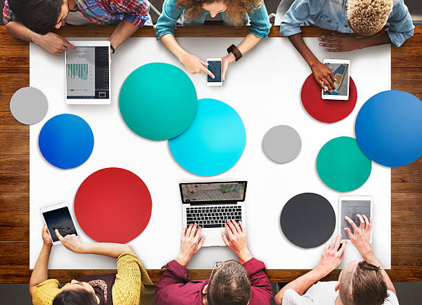 istock Diverse People Hands Team Busy Devices Concept 590593146