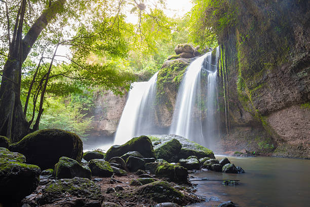 istock Amazing beautiful waterfalls in deep forest at Haew Suwat Waterfall 590593582