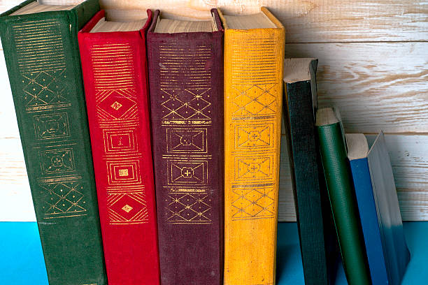 istock Set of books in the library. Knowledge, Science. Toned image. 590595414