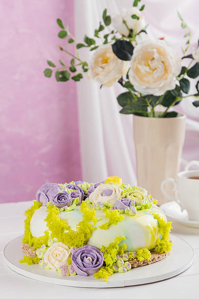 istock Colorful butter cream flowers cake 590595658