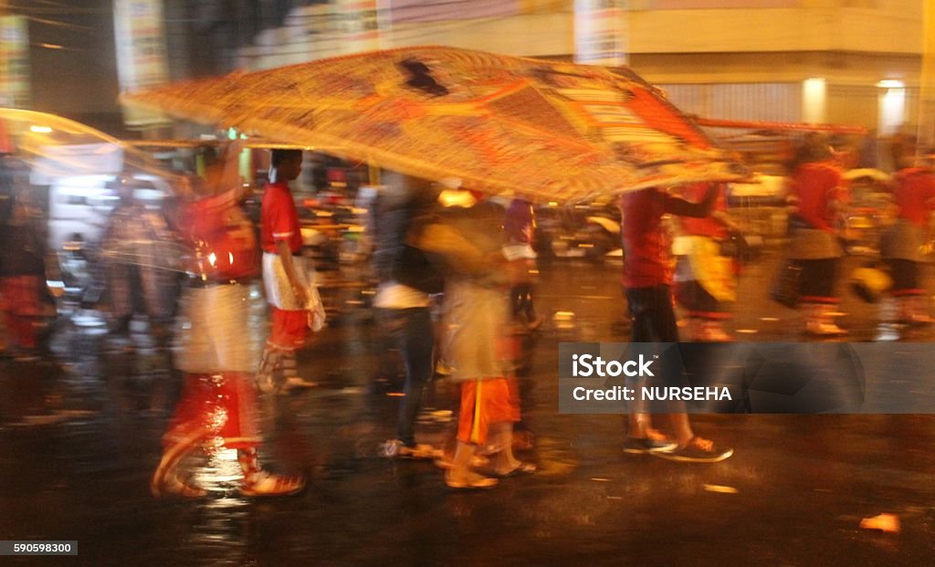 Sheltering Under Gunungan community arts culture of Central Java , Indonesia Art Stock Photo