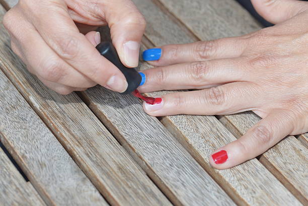 istock Manicure nail paint multi color 590602522