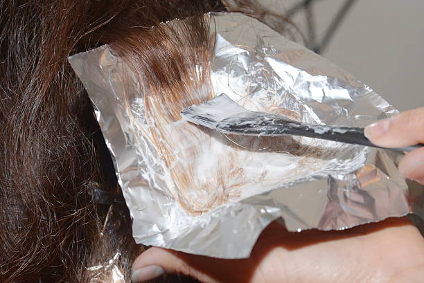 istock hair coloring in the salon 590602570