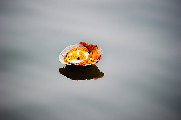 istock Burning pooja candle at aarti ceremony on the Ganges, Varanasi 590610556