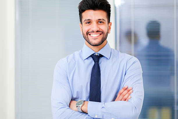 istock Smiling young businessman portrait 590610698