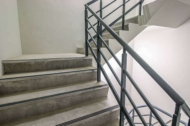 istock Spiral Stairway, success, way to escape, emergency fire exit stairway. 590612688