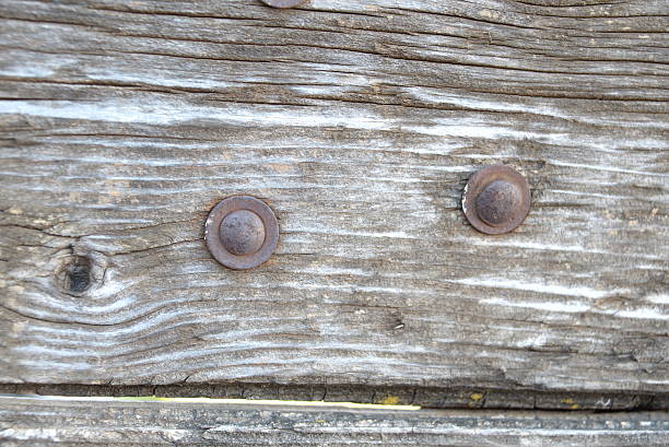 istock Old, vintage, wood with metal rivets. Background. 590612852