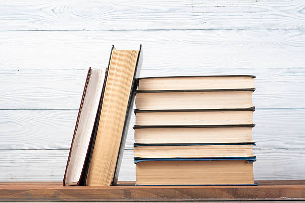 istock Stack of colorful books. Education background. Back to school. Copy 590612880