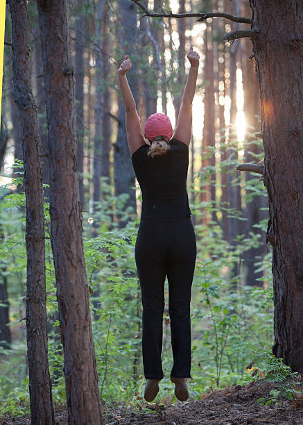 istock fitness in the forest in the evening 590613452