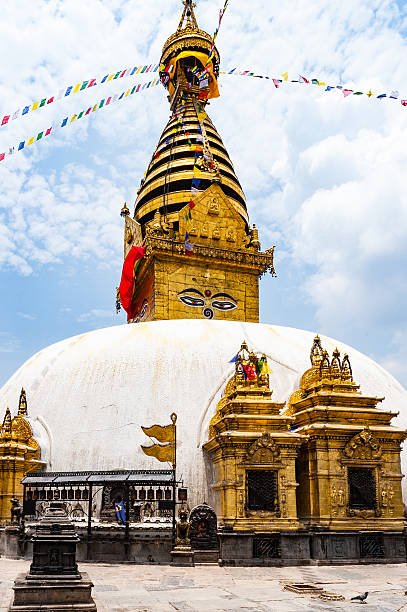 istock Swayambhunath stupa with buddha eyes and prayer flags 590614220