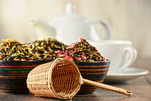 istock Composition with bowls of tea leaves 590618870