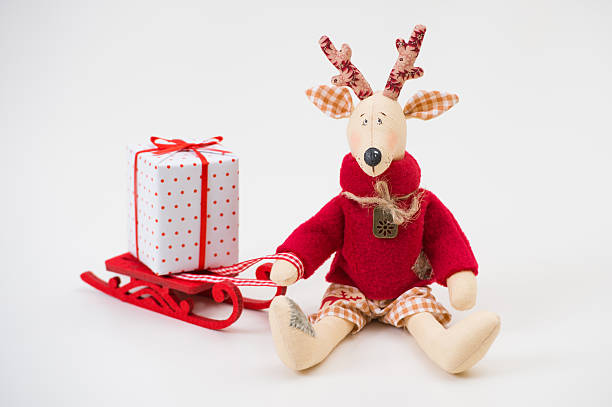 istock Gift boxes with presents wrapped in red paper with ornament 590619258