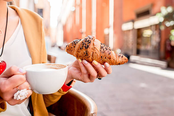 istock Woman having italian breakfast 590619562