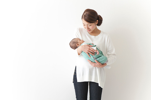 Japanese mother holding baby