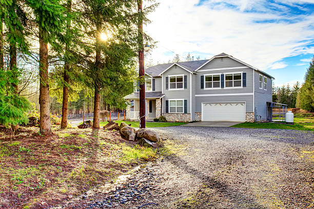 istock Two level blue country farm house with rocks trim 590620580