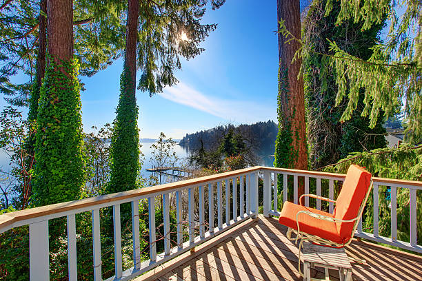 istock Walkout deck  with chairs and amazing water view 590622808