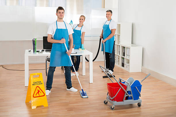 istock Cleaners Team Cleaning Floor 590622850