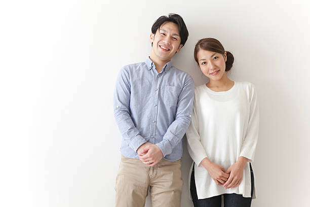 istock Japanese couple smiling 590623678