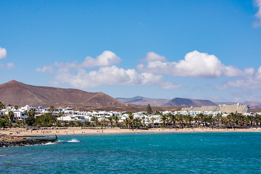 View of Costa Teguise on a beautiful day, a touristic resort on Lanzarote island, Spain 