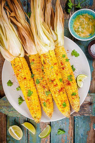 istock baked sweet corn cobs with herb butter and lime 590627238