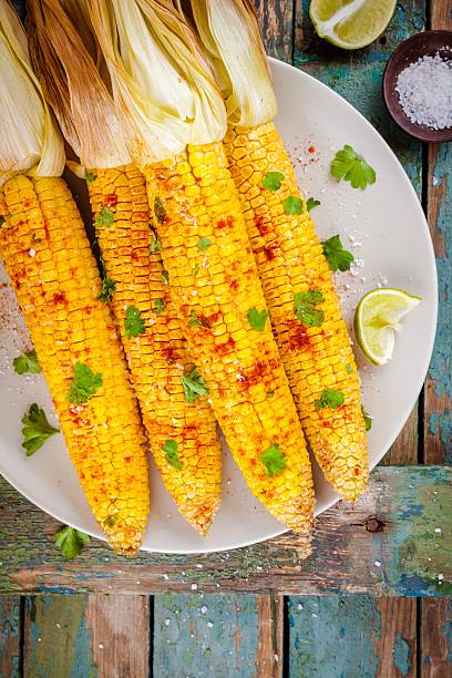 istock baked sweet corn cobs with herb butter and lime 590627266