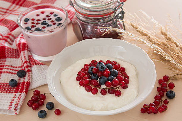 istock cottage cheese with berries and yogurt for breakfast 590627622