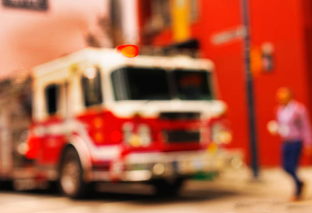 Firefighters drive to an emergency