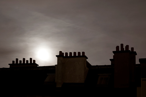 Moonlight on Paris' rooftop, during summer