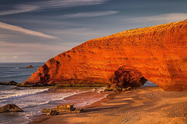 istock Red arches of Legzira beach 591400528