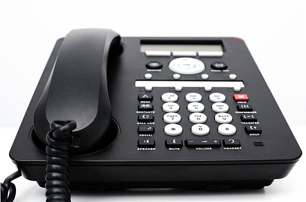istock Closeup of a telephone keypad with selective focus. 591401352